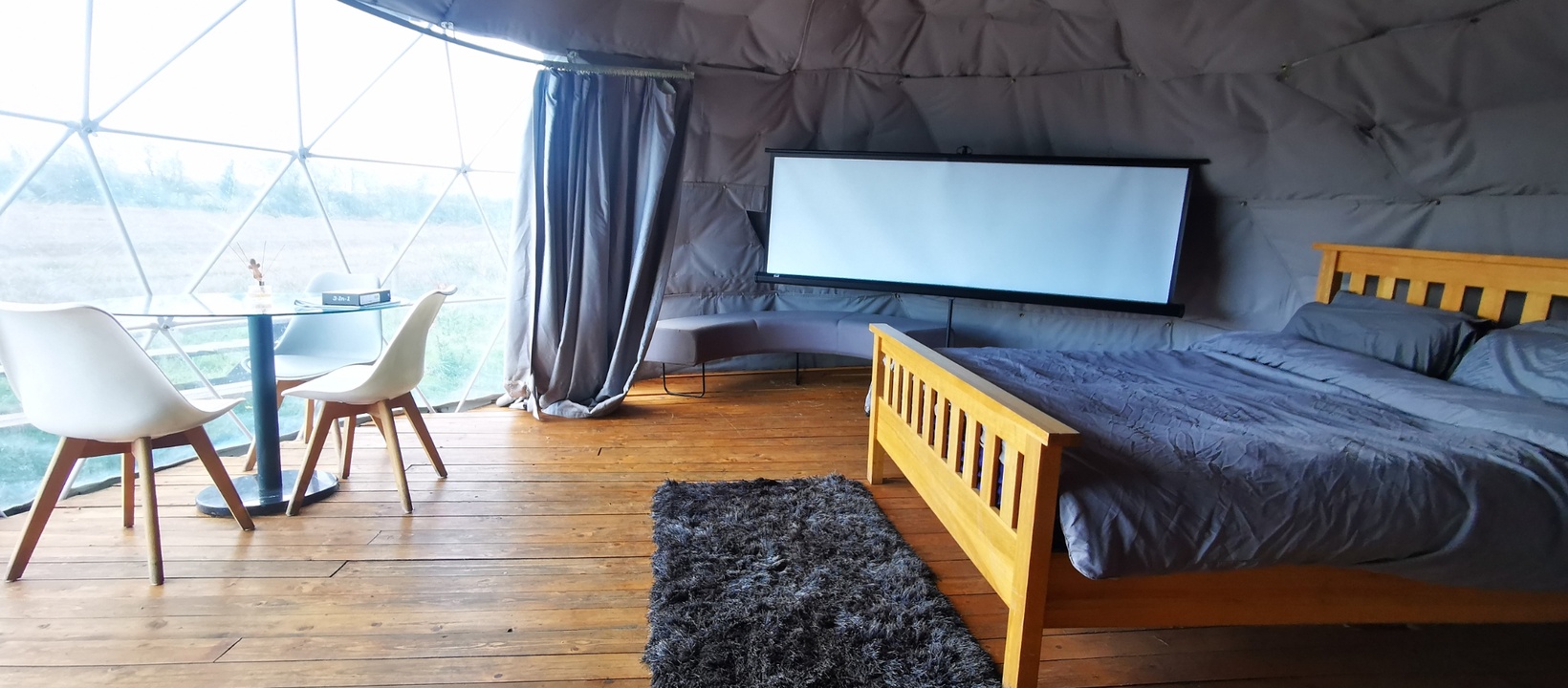 Big Screen Cinema from Bed in Geodesic Dome