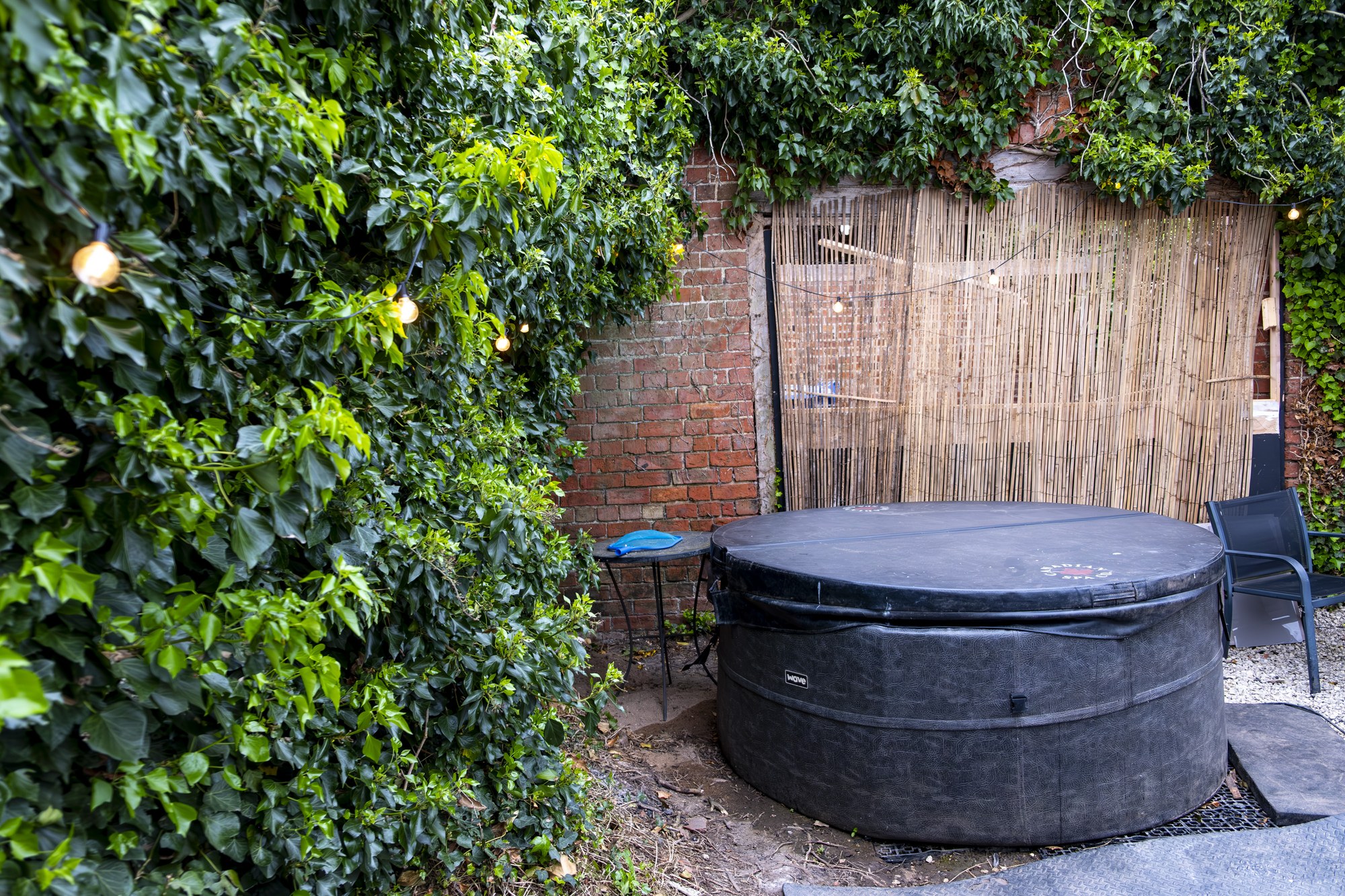Ivy Wall and Festoon Hot Tub at Secret Dome
